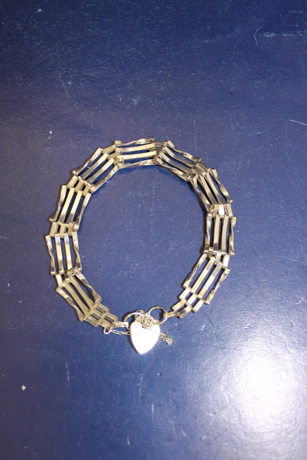A 925 silver gate & padlock bracelet
