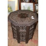 A vintage North African dark wood two piece portable tea table h50, w48cm unable to post