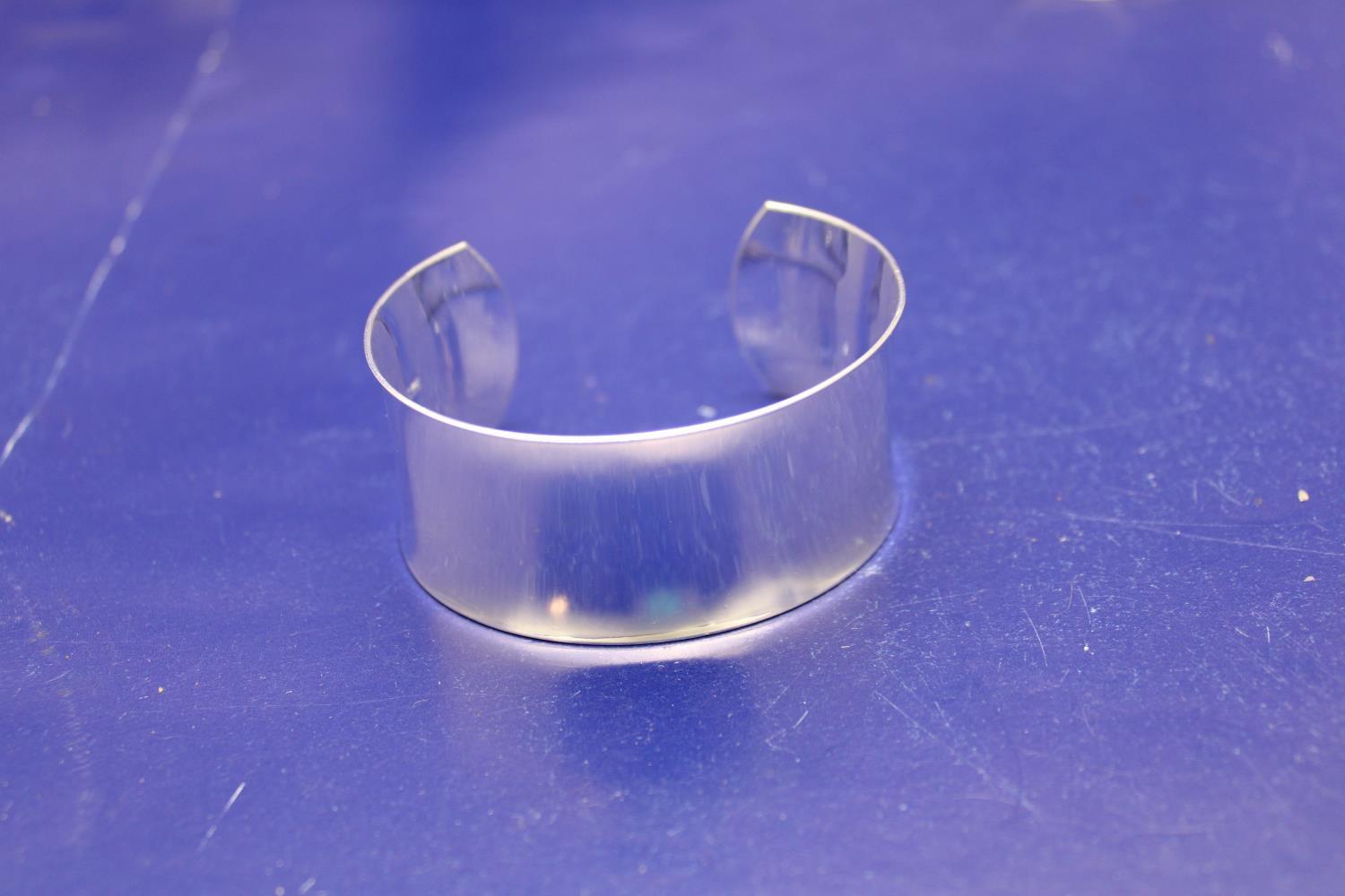 A large 925 silver bangle