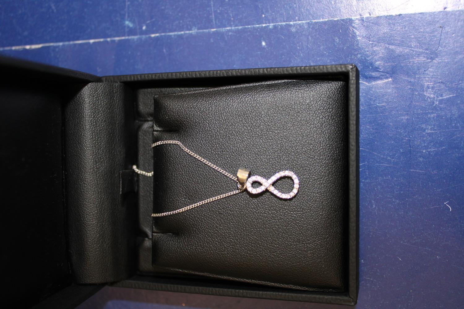 A boxed 925 silver pendant & chain