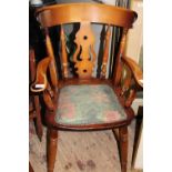 A vintage oak Captains style chair unable to post