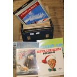 A box of mixed genre LP records