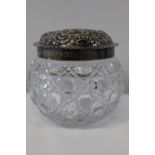 A hallmarked silver topped hob nail cut bottle