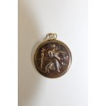 A 9ct gold St Christopher pendant 1.8 grams