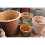 A large terracotta planter 38cm tall x 40cm dia & assorted flower pots