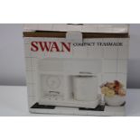 A boxed Swan compact teasmade