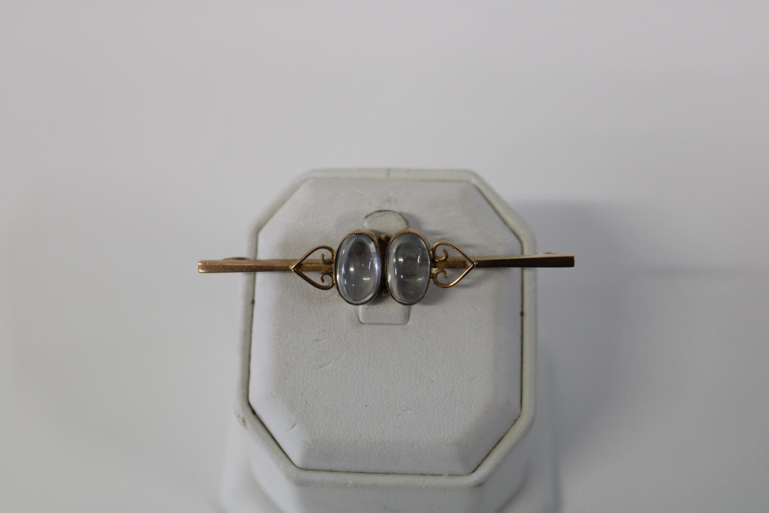 A 9ct gold & moonstone brooch