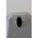 A 10ct gold & onyx ring size E