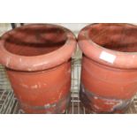 A pair of terracotta chimney pots unable to post 33cm tall x 28cm dia