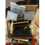 A box full of assorted photo frames