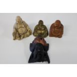 Three assorted Budha figures & one other