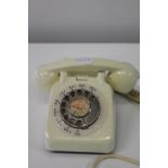 A vintage cream coloured GPO telephone