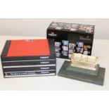 A Tissot watch box & collectors books & a vintage perpetual calendar