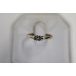 A 9ct gold diamond solitaire ring size L
