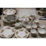 A quality Coclough 'Amanda' pattern dinner service (approx 48 pieces total)