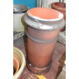 A large terracotta chimney pot unable to post 64cm tall x 34cm dia