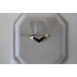 A 9ct gold & sapphire wishbone ring size M