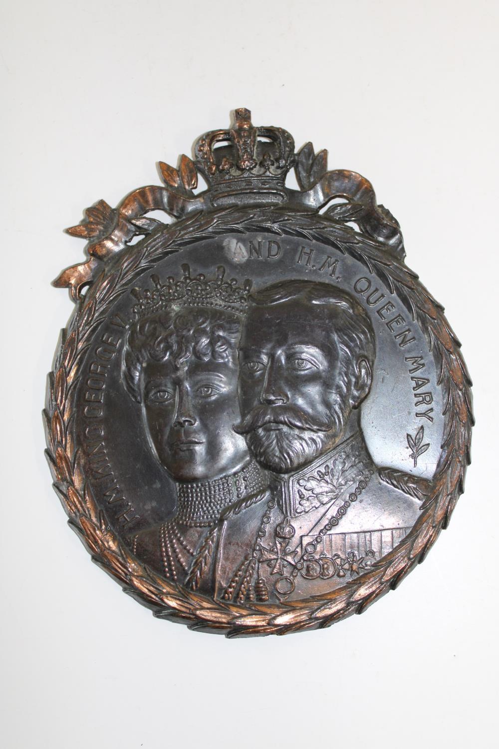 A bronzed plaque depicting George V & Princess Mary 14x11cm