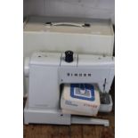 A Singer electric sewing machine with foot pedal & cables etc unable to post