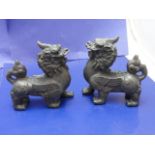A pair of Chinese bronze Fou Dogs 12cm x 11cm