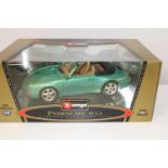 A boxed Burago Porsche 911 model