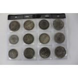 Twelve re-production German Thaler coins