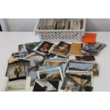 A large collection of assorted postcards