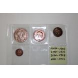 Four early 2oth century French coin sets