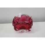 A Chribska cranberry coloured bowl 12cm tall