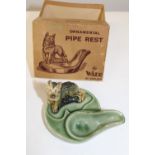 A collectable boxed Wade pipe rest