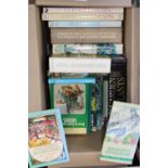 A box of gardening books