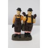 A ceramic Laurel & Hardy figurine