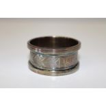 A hallmarked silver napkin ring