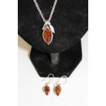 A 925 silver pendant & earring set with amber decoration pendant on a long 925 silver chain