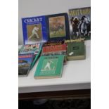 A selection of sporting related books etc