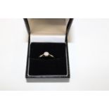 A 9ct gold diamond solitaire ring size size L