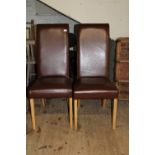 A pair of brown leatherette dining/hall chairs Unable to post h108cm