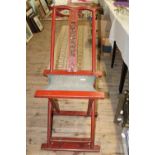 A antique Chinese folding chair with carved decoration and signed verso Unable to post