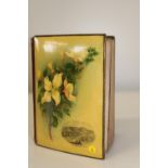 An antique Mauchlin ware photo album with photo's