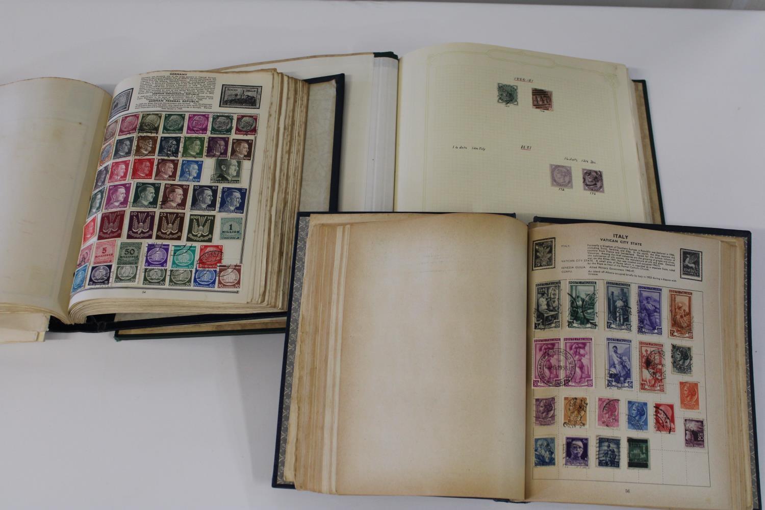 Three assorted stamp albums