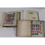 Three assorted stamp albums