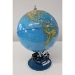 A vintage light up World globe