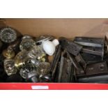 A box of vintage door furniture etc