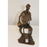 A cast musical themed sculpture h28cm