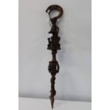 A hand carved African tribal walking stick