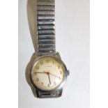 A vintage Garrard stainless steel body & strap wrist watch (with dedication to the back)