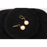 A pair of 9ct gold & faux pearl earrings