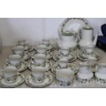 A large Royal Doulton "Vanity Fair" tea & coffee service (36 pieces)