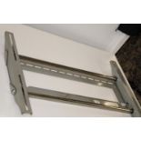 A metal wall mounted TV bracket (For 42 inch TV's plus)