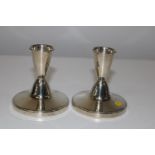 A pair of 1959 Adie bros hallmarked silver dwarf candlesticks